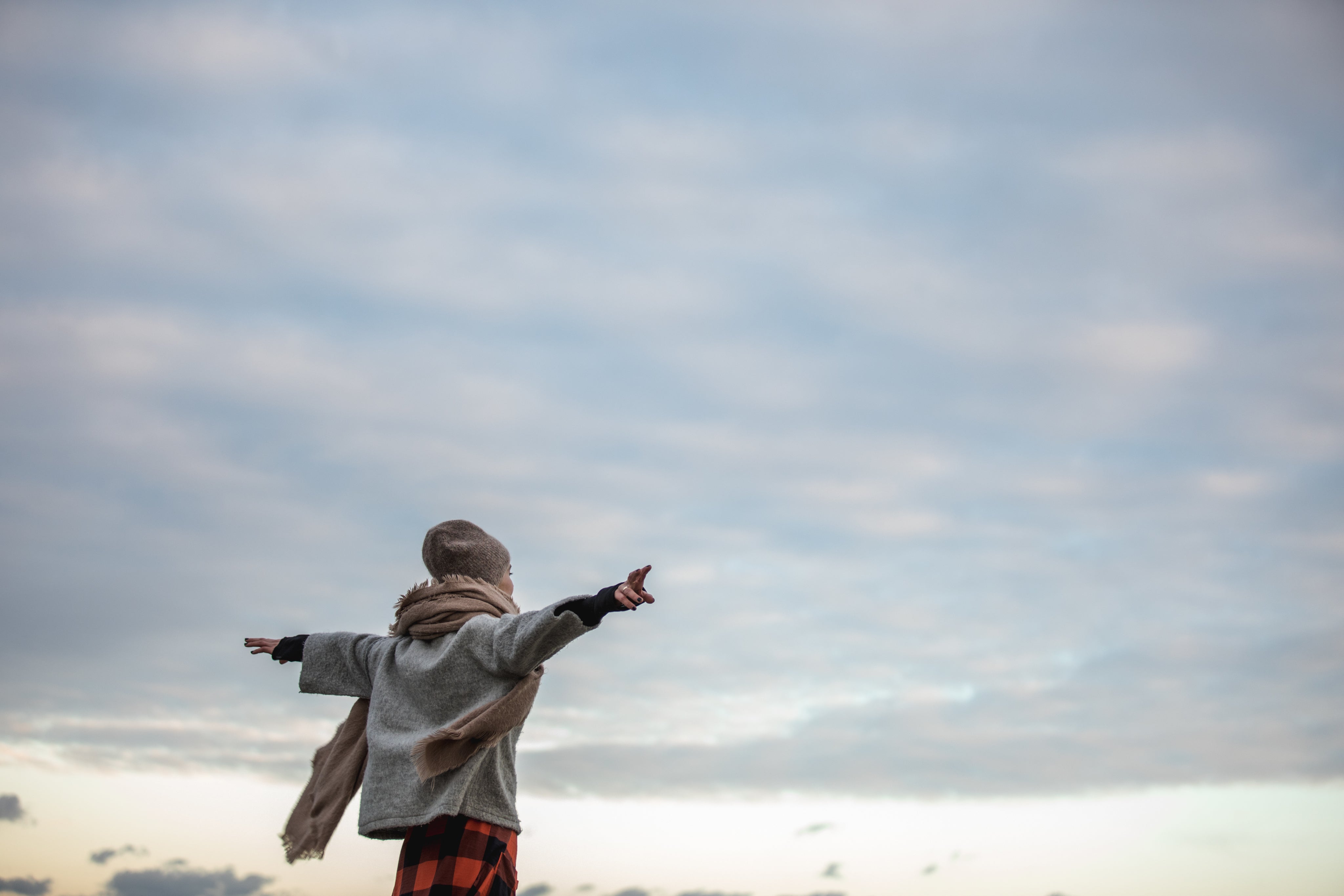 files/young-woman-spreading-her-arms-in-autumn-breeze.jpg